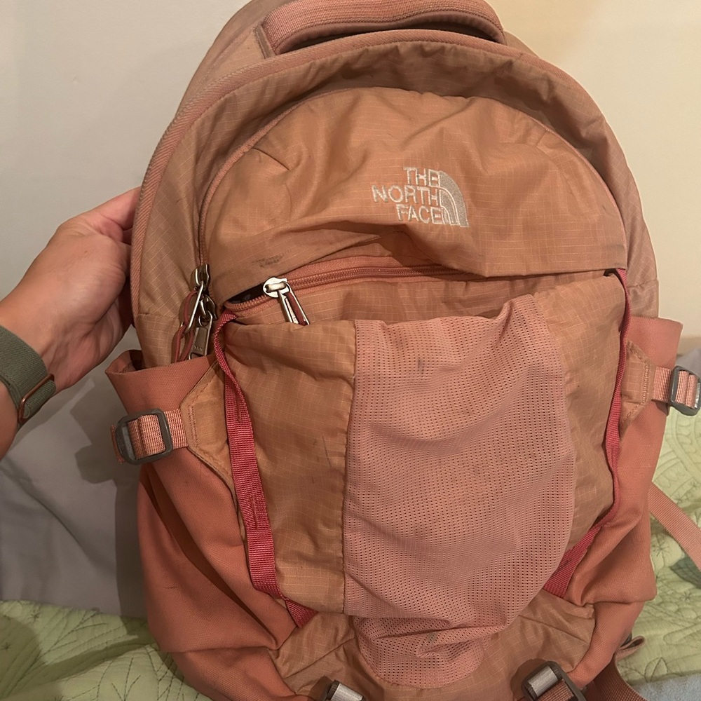 The North Face pink Backpack Durable Outdoor Essential